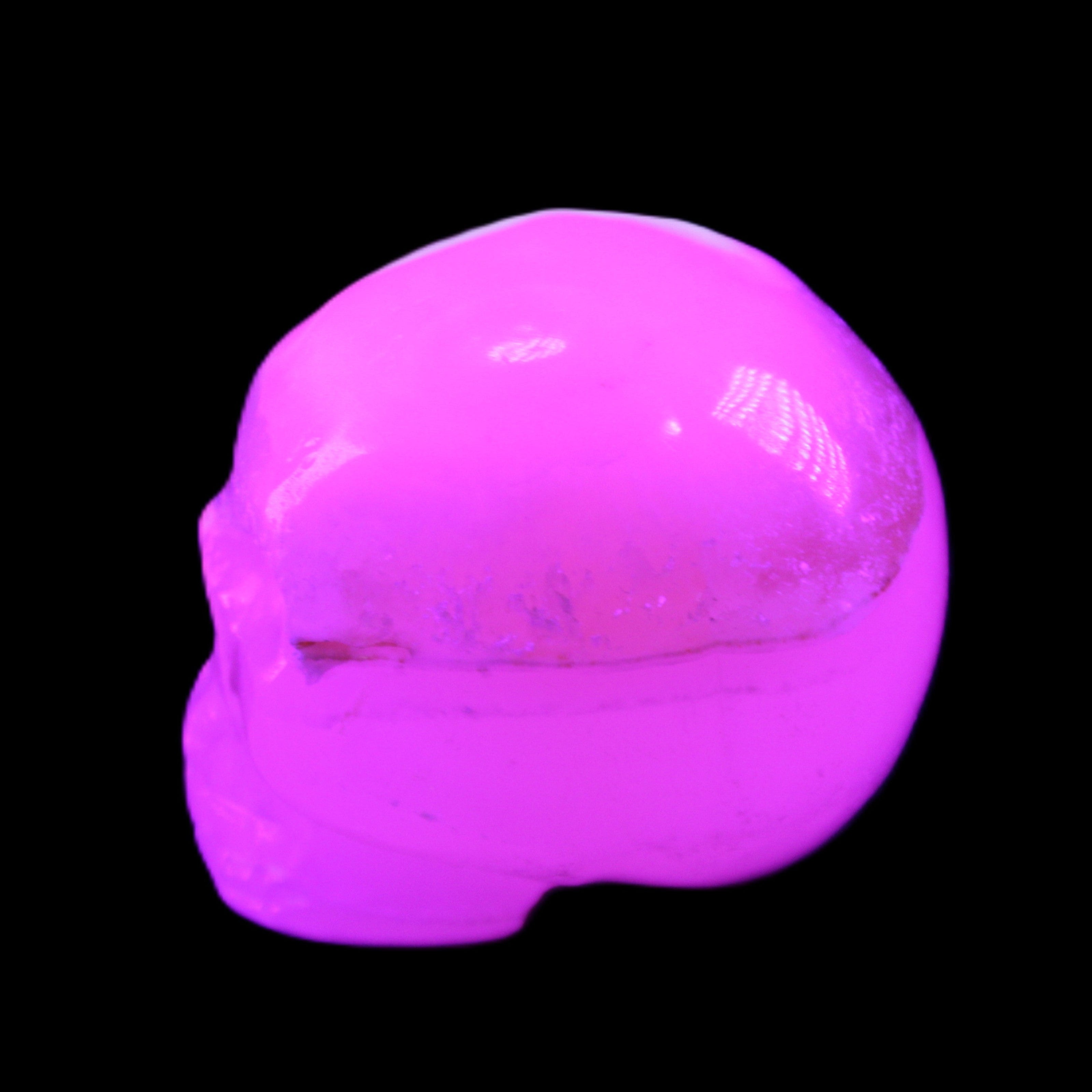 Mangano Calcite skull 38*55*48mm 167g in sunlight - Rocks and Things Store