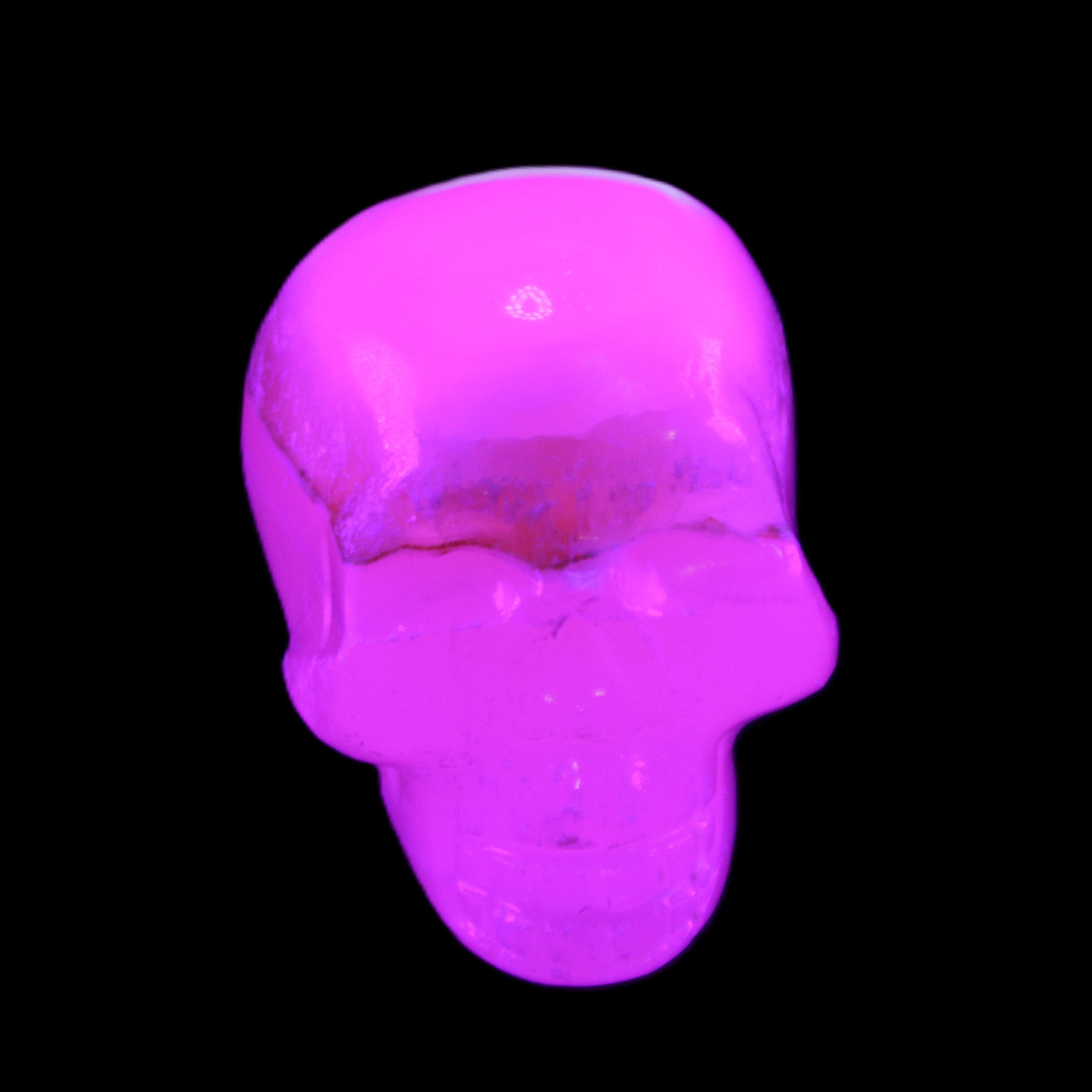 Mangano Calcite skull 38*55*48mm 167g in sunlight - Rocks and Things Store