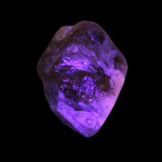 Yellow crystal Apatite with pink faces UV reactive from Afghanistan 115.6ct 23.1g in UV light - Rocks and Things Store