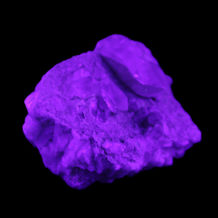Quartz crystals in Feldspar matrix from Pakistan 313.8ct 62.8g in UV light - Rocks and Things Store