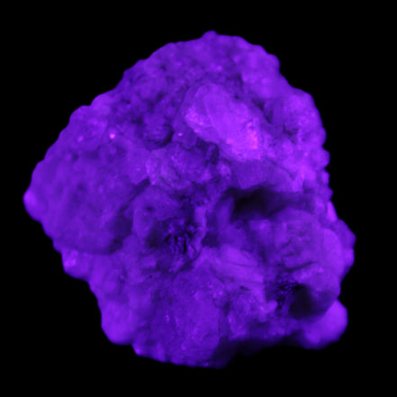 Quartz crystals in Feldspar matrix from Pakistan 313.8ct 62.8g in UV light - Rocks and Things Store