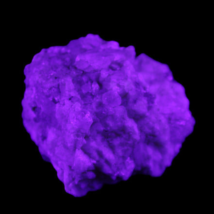 Quartz crystals in Feldspar matrix from Pakistan 313.8ct 62.8g in UV light - Rocks and Things Store