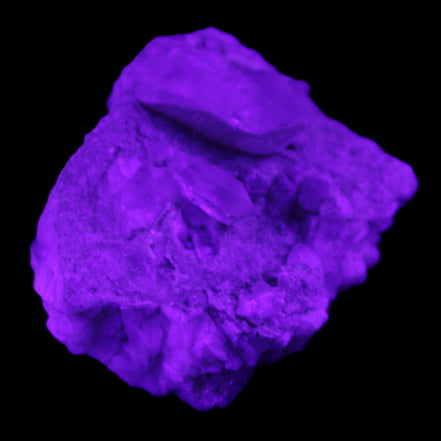 Quartz crystals in Feldspar matrix from Pakistan 313.8ct 62.8g in UV light - Rocks and Things Store