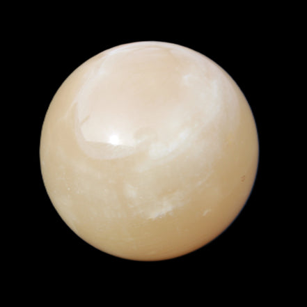 Honey Calcite sphere 174/176g in sunlight - Rocks and Things Store