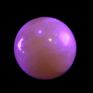 Honey Calcite sphere 174/176g in UV light - Rocks and Things Store