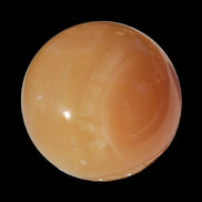 Honey Calcite sphere 174/176g in sunshine - Rocks and Things Store