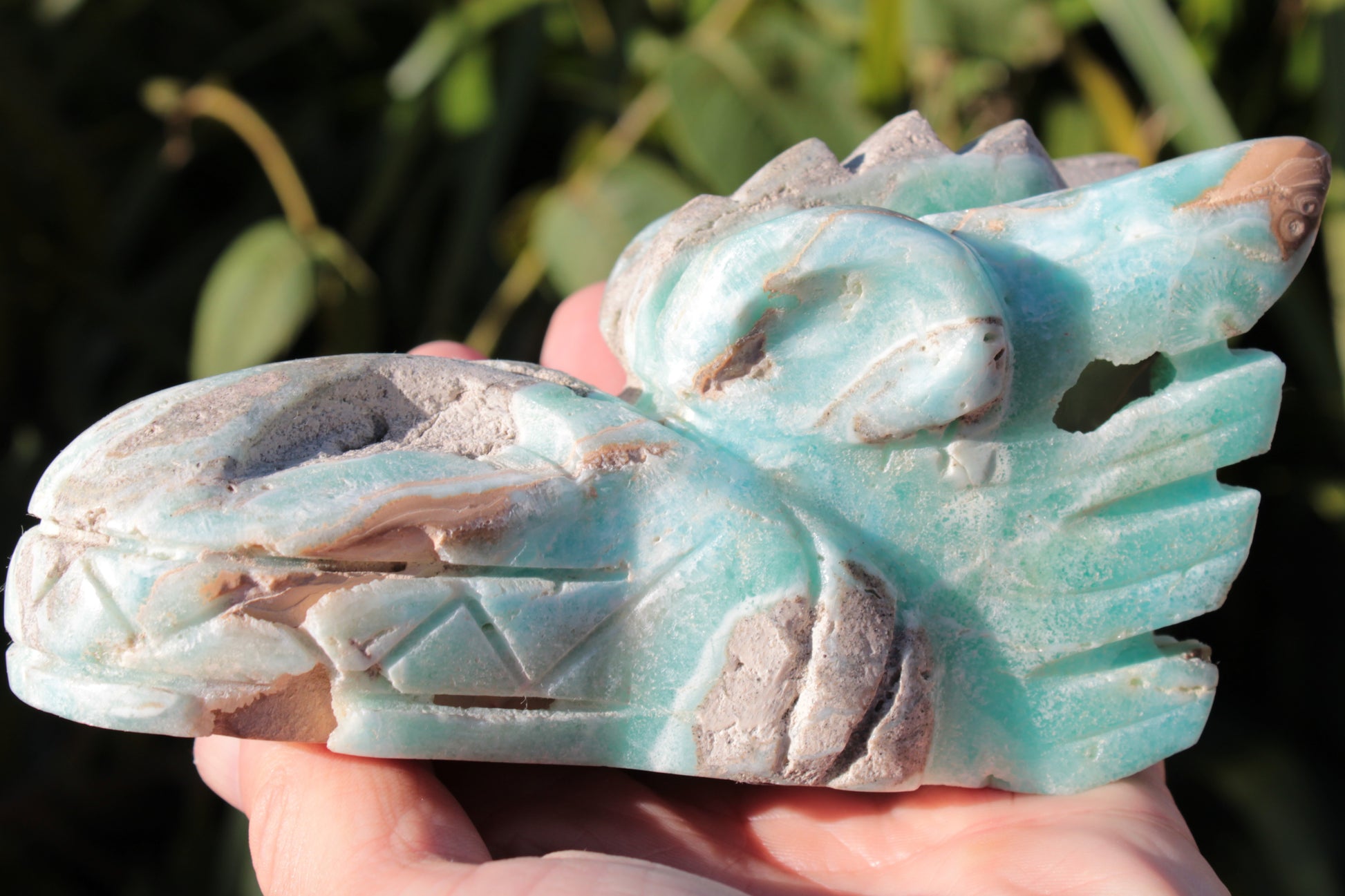 Caribbean Calcite hand-carved dragon's head 675g Rocks and Things