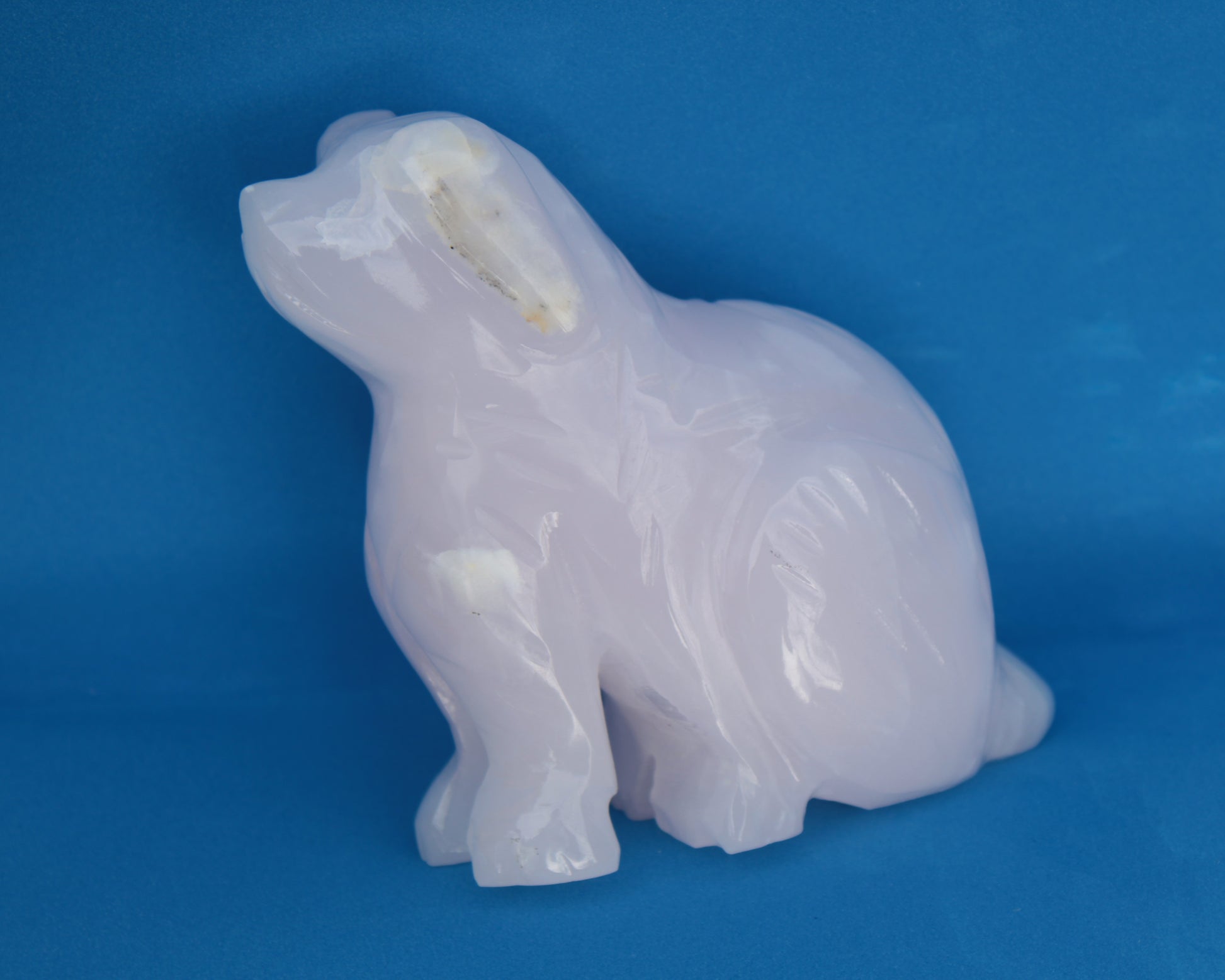 Mangano Calcite hand-carved sitting dog 604g Rocks and Things