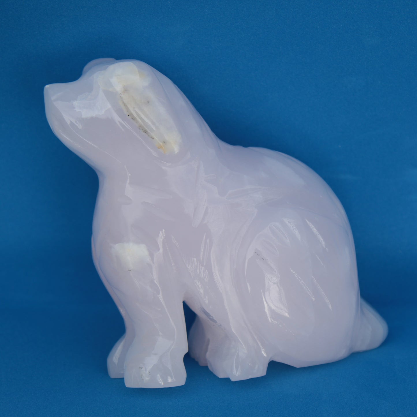 Mangano Calcite hand-carved sitting dog 604g Rocks and Things