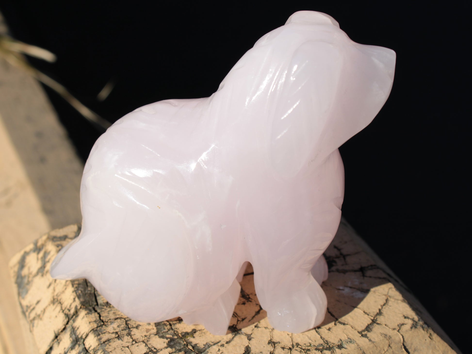 Mangano Calcite hand-carved sitting dog 604g Rocks and Things