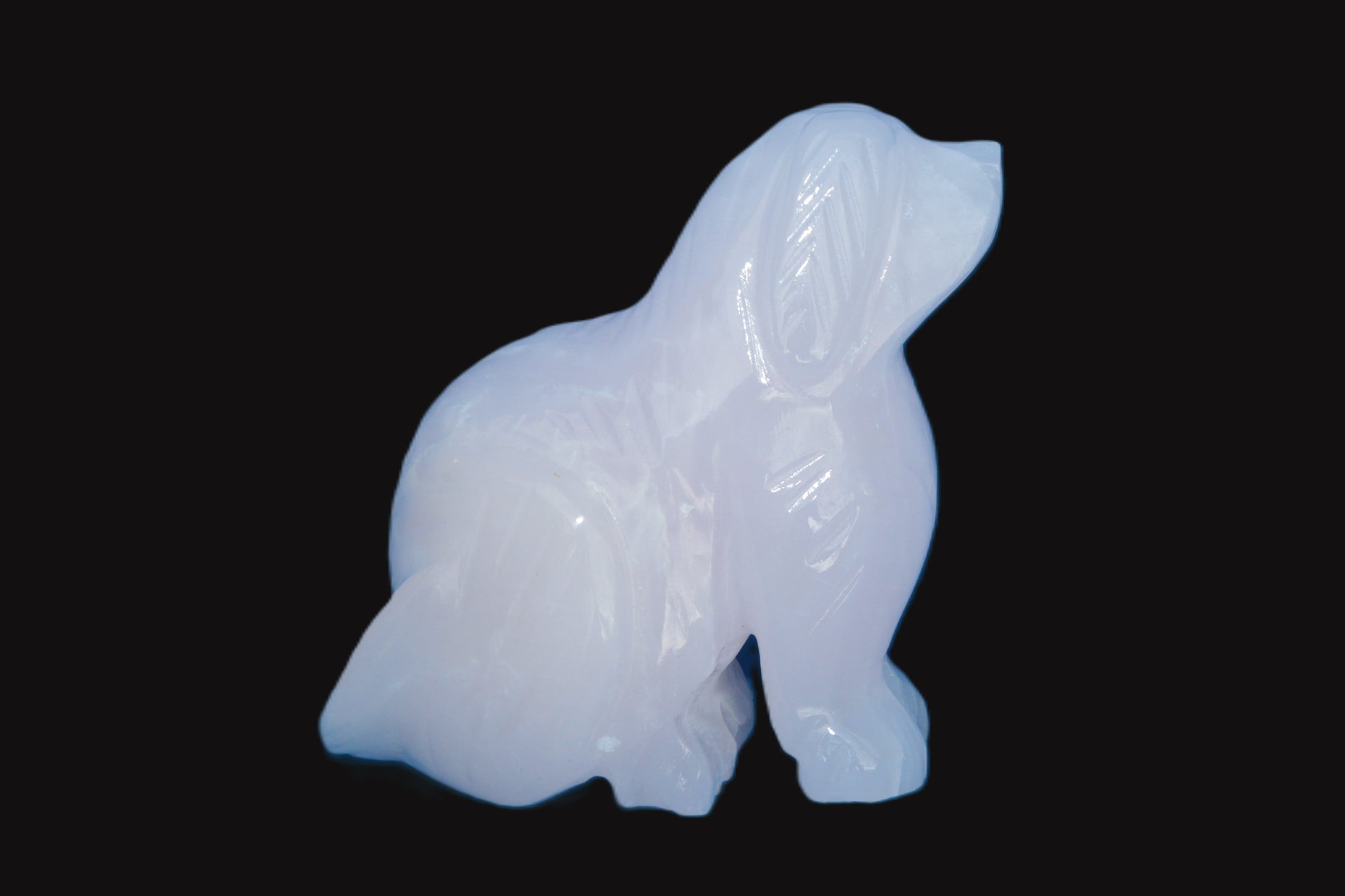 Mangano Calcite hand-carved sitting dog 604g Rocks and Things