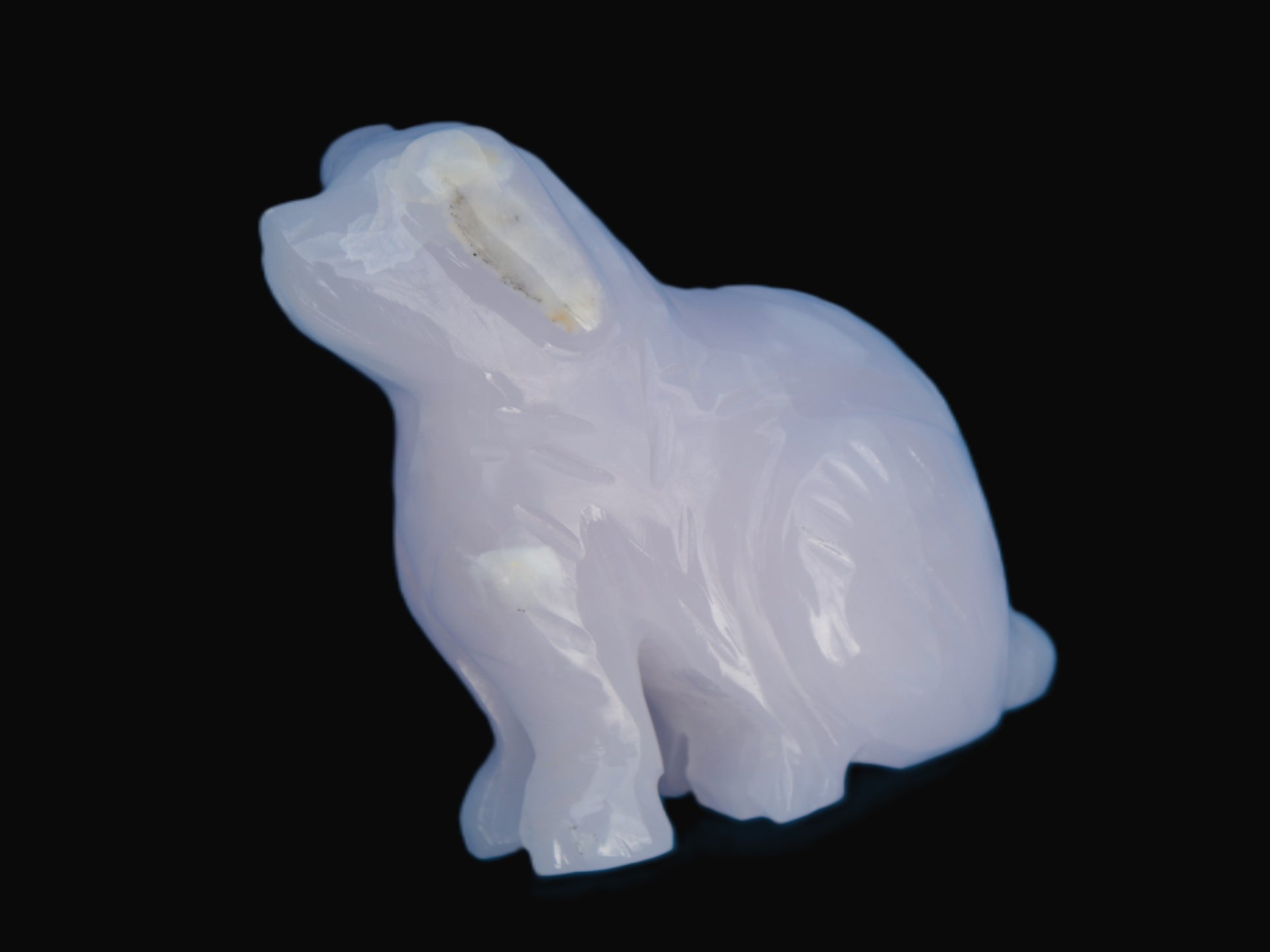 Mangano Calcite hand-carved sitting dog 604g Rocks and Things