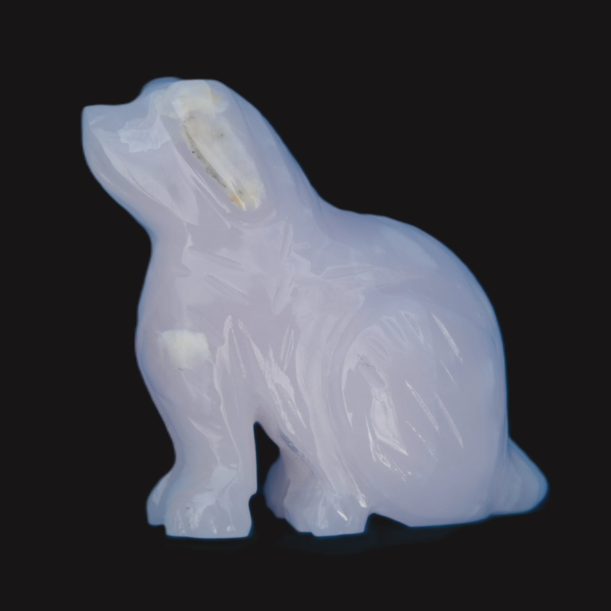 Mangano Calcite hand-carved sitting dog 604g Rocks and Things