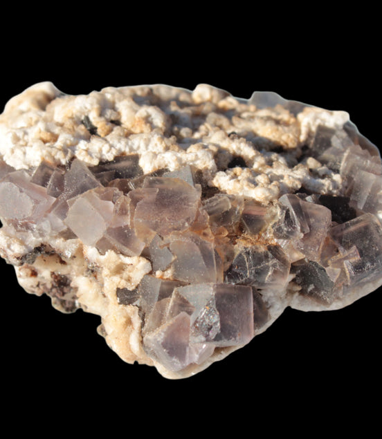 Cubic Fluorite cluster with UV reactive Calcite 278g in sunshine - Rocks and Things Store