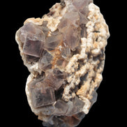 Cubic Fluorite cluster with UV reactive Calcite 278g in sunshine - Rocks and Things Store