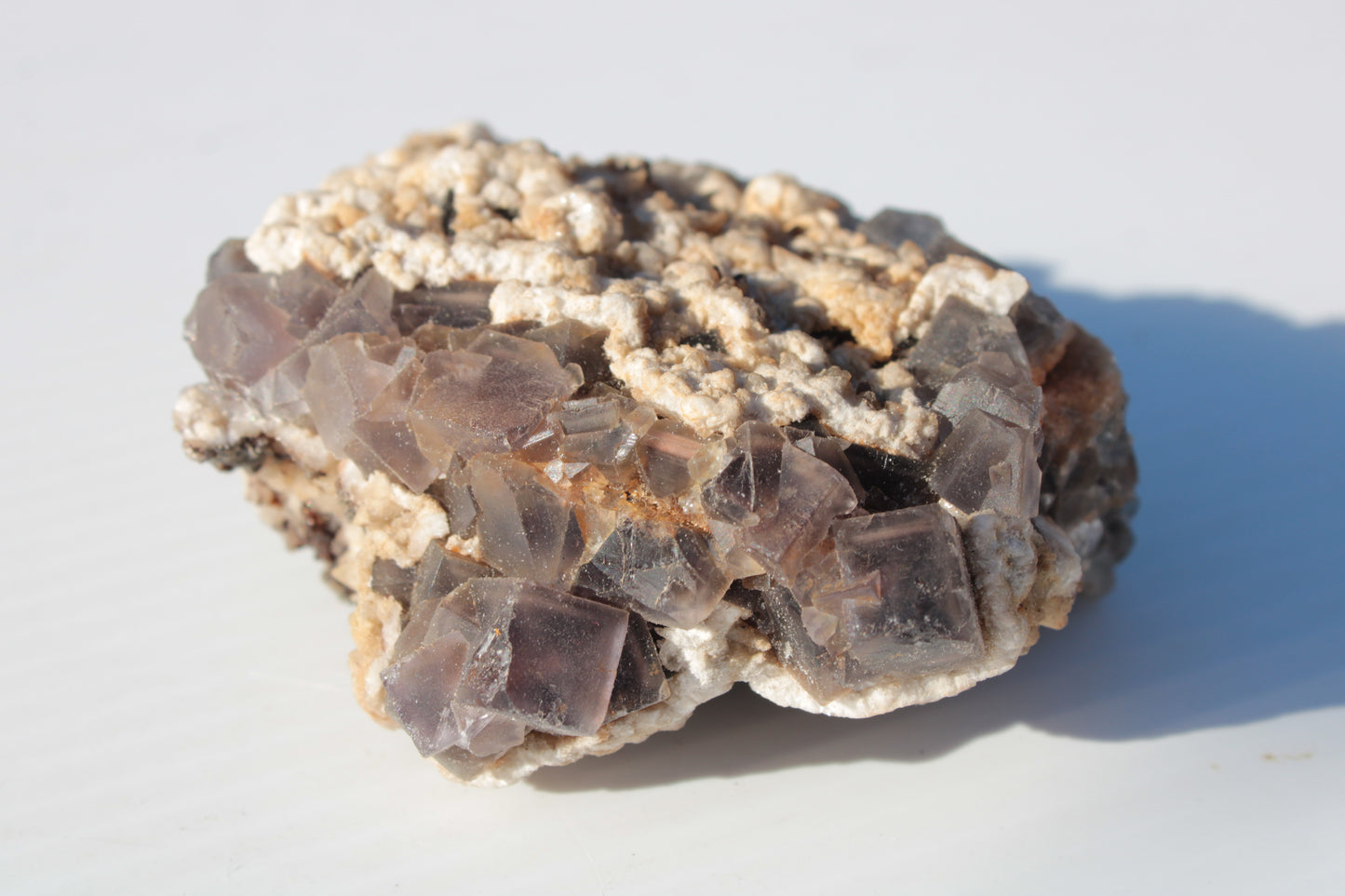 Cubic Fluorite cluster with UV reactive Calcite 278g Rocks and Things