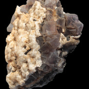 Cubic Fluorite cluster with UV reactive Calcite 278g in sunshine - Rocks and Things Store