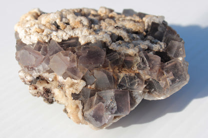 Cubic Fluorite cluster with UV reactive Calcite 278g Rocks and Things