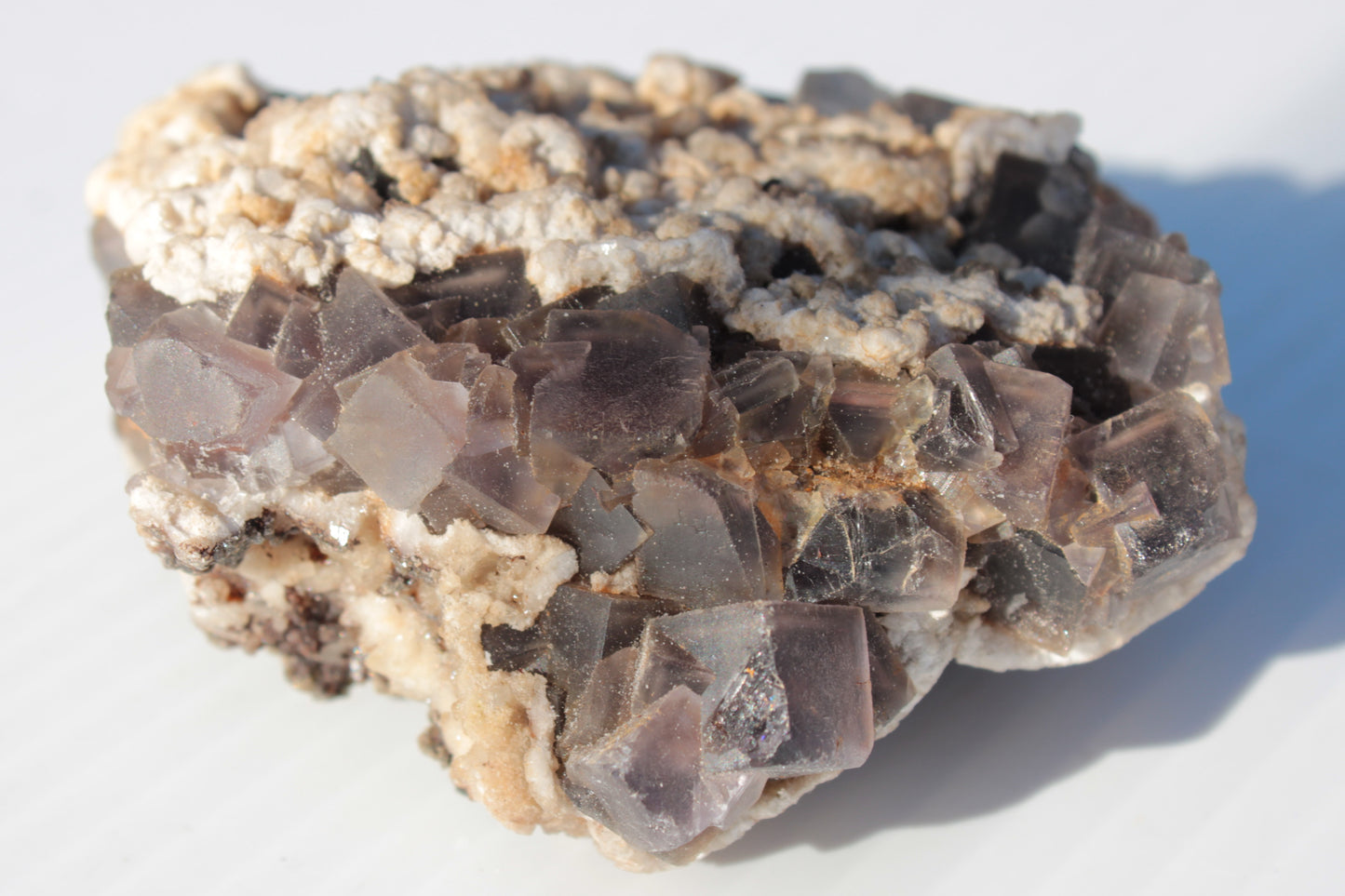 Cubic Fluorite cluster with UV reactive Calcite 278g Rocks and Things