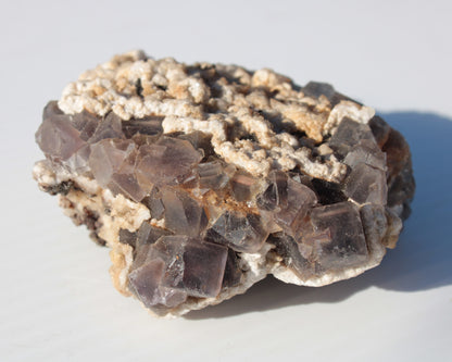 Cubic Fluorite cluster with UV reactive Calcite 278g Rocks and Things