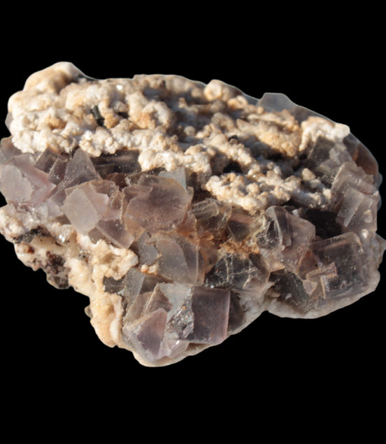Cubic Fluorite cluster with UV reactive Calcite 278g in sunshine - Rocks and Things Store