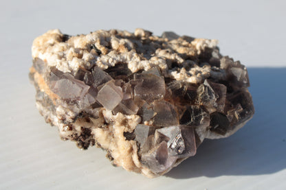 Cubic Fluorite cluster with UV reactive Calcite 278g Rocks and Things