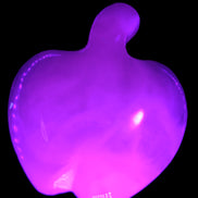 Mangano Calcite apple 37.8g in UV light