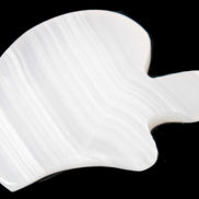 Mangano Calcite hand-carved bitten apple 80g Rocks and Things