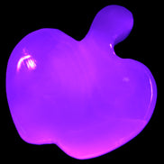 Mangano Calcite apple 62-68g in UV light