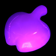 Mangano Calcite apple 62-68g in UV light