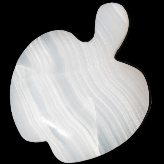 Mangano Calcite hand-carved apple 50-59g in sunlight - Rocks and Things Store