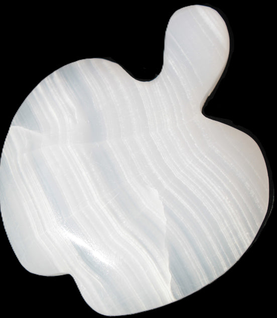 Mangano Calcite hand-carved apple 50-59g in sunlight - Rocks and Things Store