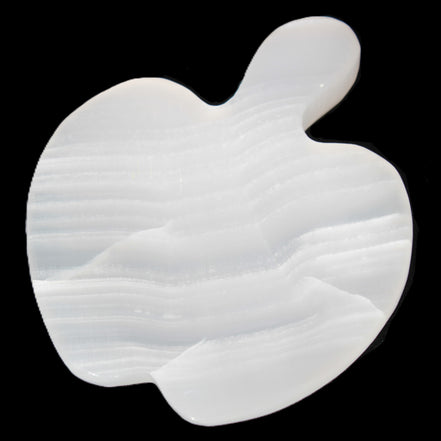 Mangano Calcite hand-carved apple 50-59g in sunlight - Rocks and Things Store