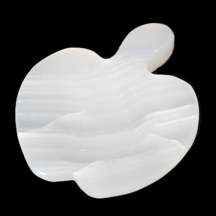 Mangano Calcite hand-carved apple 50-59g in sunlight - Rocks and Things Store