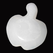 Mangano Calcite hand-carved apple 50-59g in sunlight - Rocks and Things Store