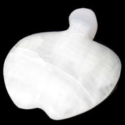 Mangano Calcite hand-carved apple 50-59g in sunlight - Rocks and Things Store