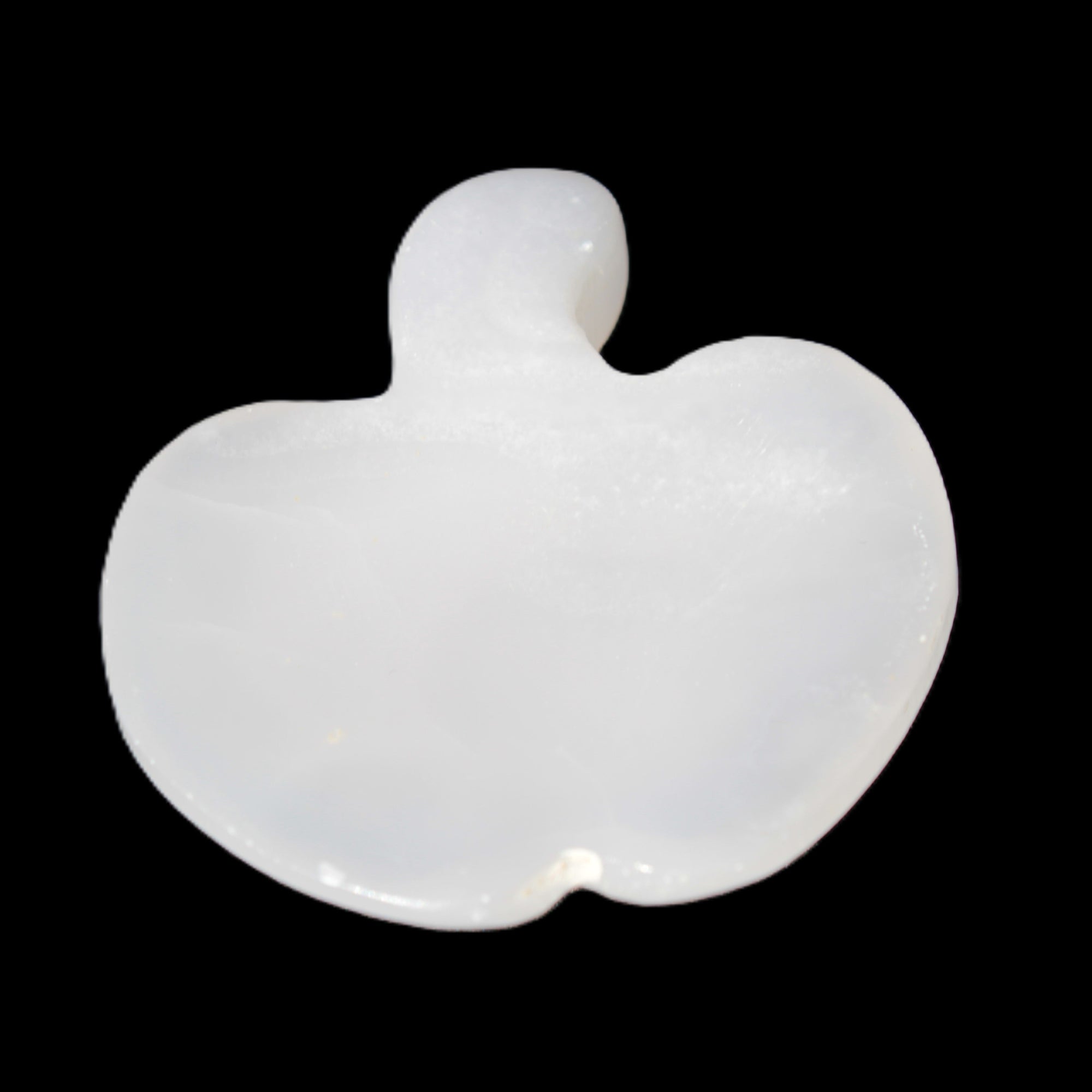 Mangano Calcite hand-carved apple 50-59g in sunlight - Rocks and Things Store