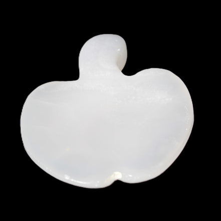 Mangano Calcite hand-carved apple 50-59g in sunlight - Rocks and Things Store