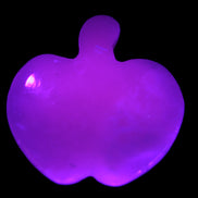 Mangano Calcite hand-carved apple 50-59g Rocks and Things