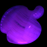 Mangano Calcite hand-carved apple 50-59g Rocks and Things