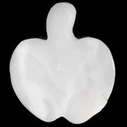 Mangano Calcite hand-carved apple 41-49g in sunlight - Rocks and Things Store