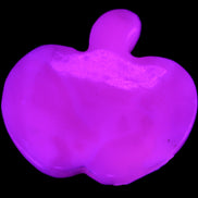 Mangano Calcite hand-carved apple 41-49g in sunlight - Rocks and Things Store