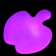 Mangano Calcite hand-carved apple 41-49g in UV light - Rocks and Things Store