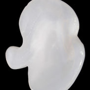 Mangano Calcite hand-carved apple 41-49g in sunlight - Rocks and Things Store