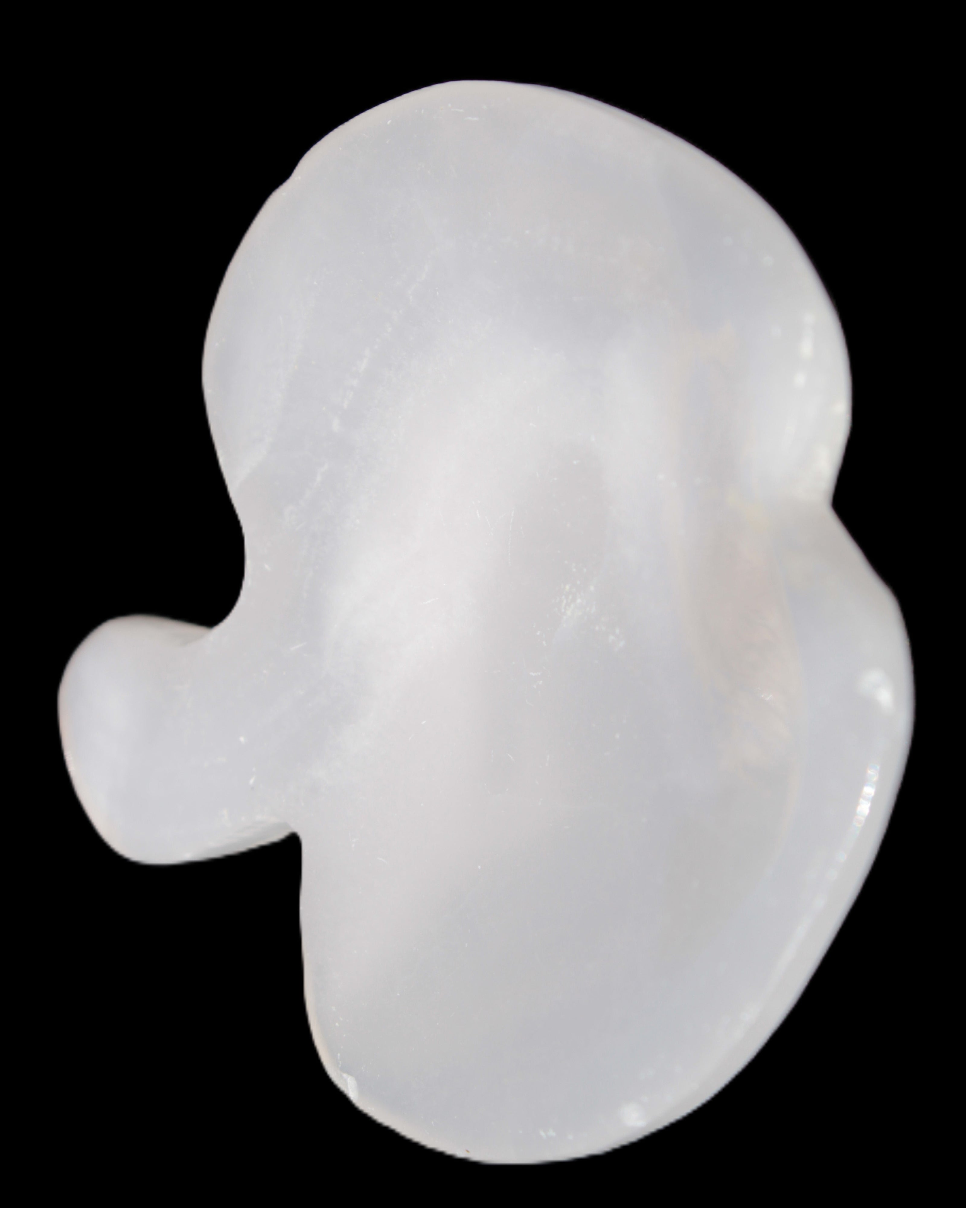 Mangano Calcite hand-carved apple 41-49g in sunlight - Rocks and Things Store