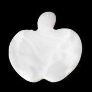 Mangano Calcite hand-carved apple 41-49g in sunlight - Rocks and Things Store