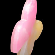 Pink and yellow Butterfly hand-carved in dyed Calcite from Pakistan 106*15*106mm 276g in sunshine - Rocks and Things Store