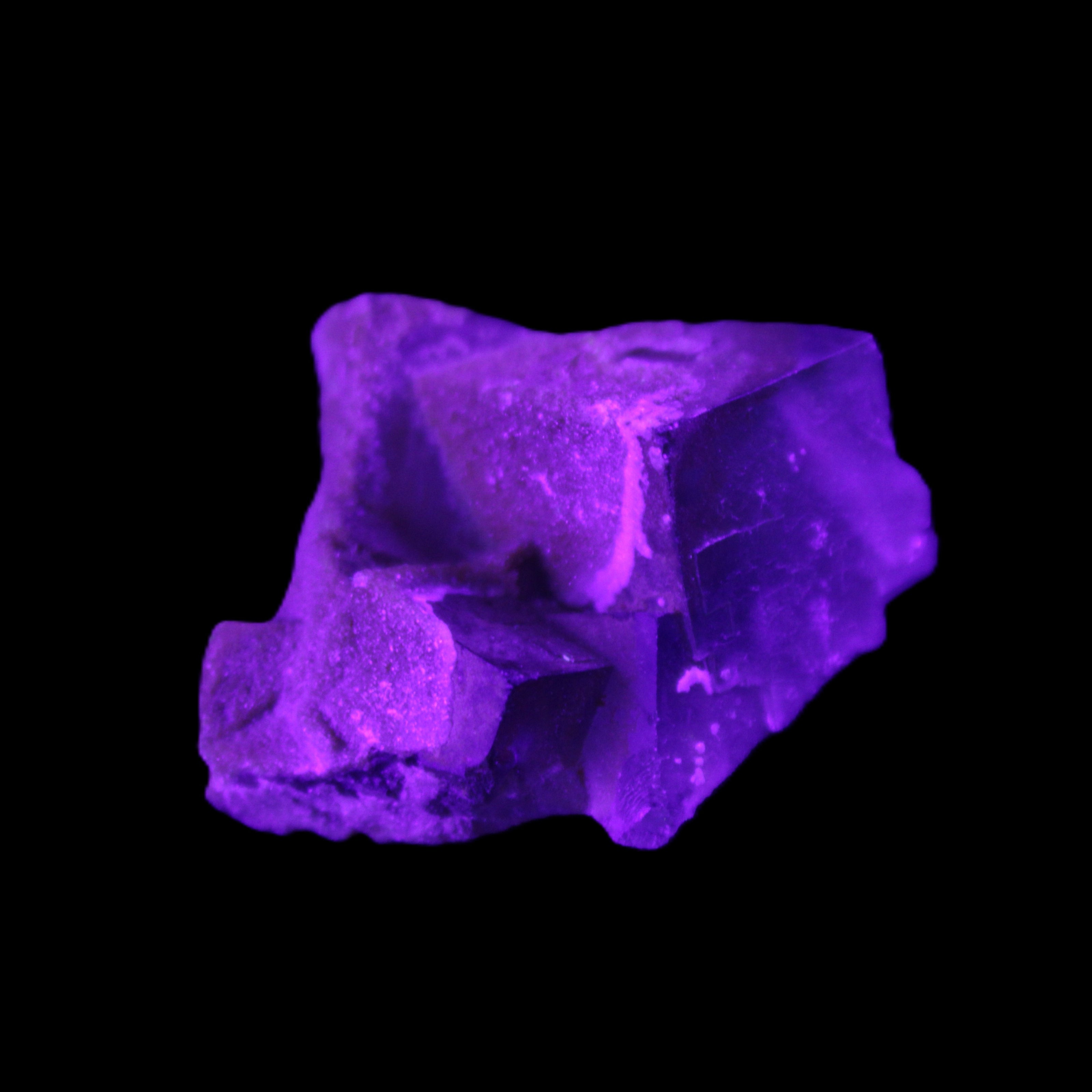 Clear cubic Fluorite cluster from Pakistan 40mm 31.2g in UV light - Rocks and Things Store