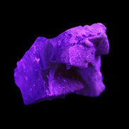 Clear cubic Fluorite cluster from Pakistan 40mm 31.2g in UV light - Rocks and Things Store