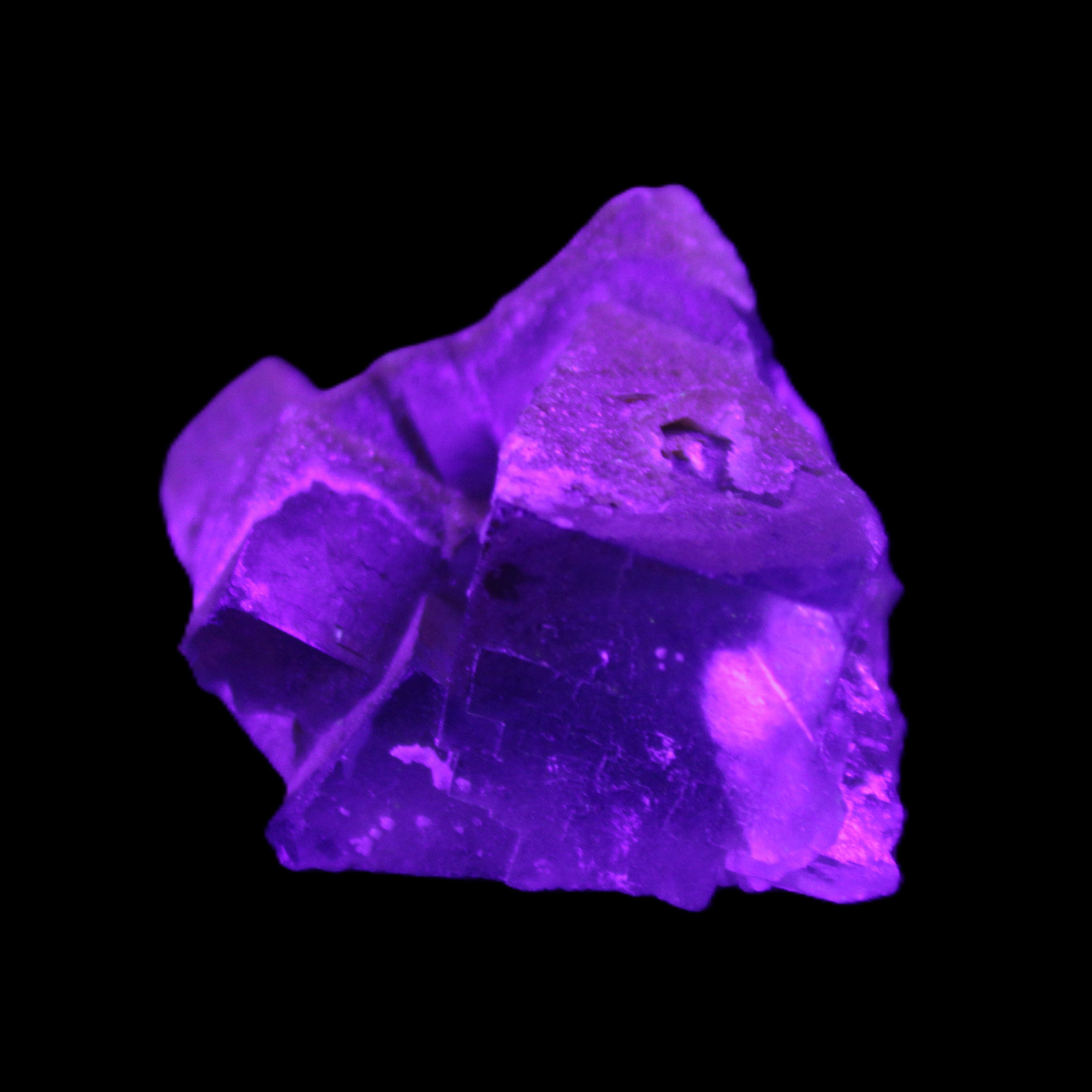 Clear cubic Fluorite cluster from Pakistan 40mm 31.2g in UV light - Rocks and Things Store